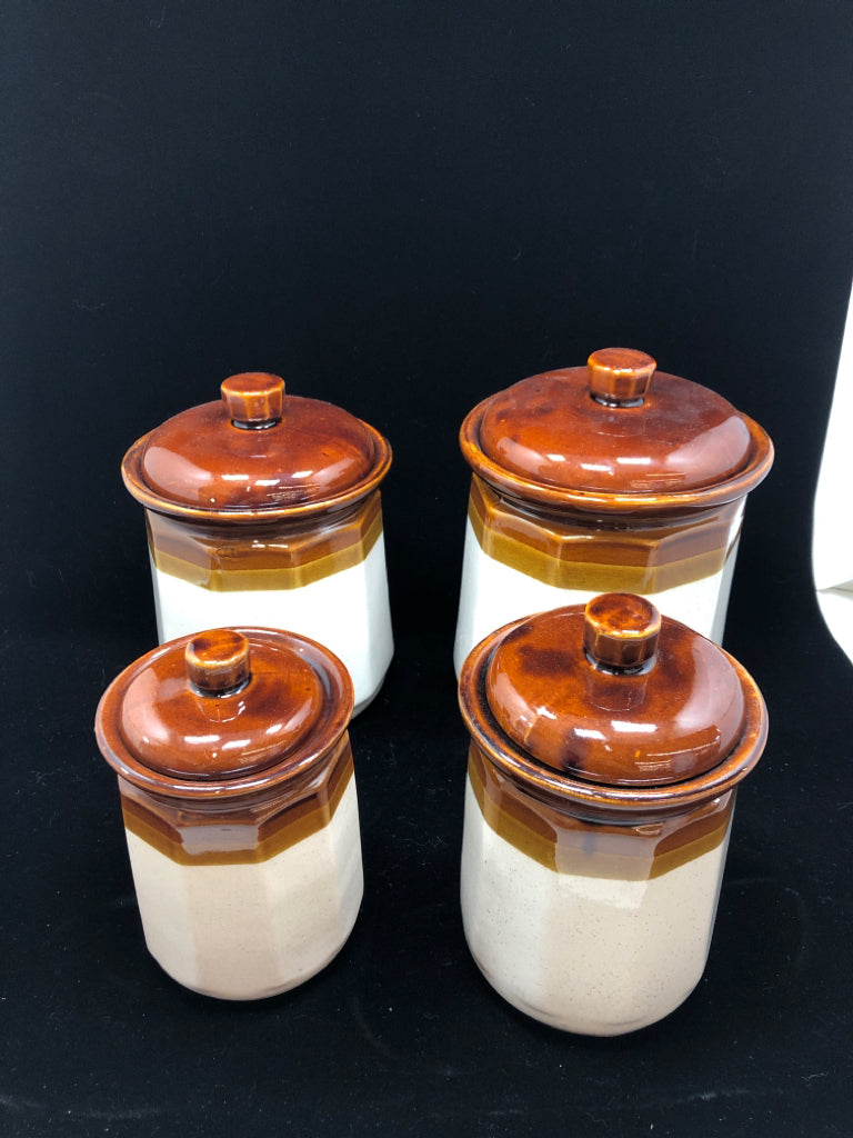 4 BROWN DIPPED CERAMIC CANISTERS.