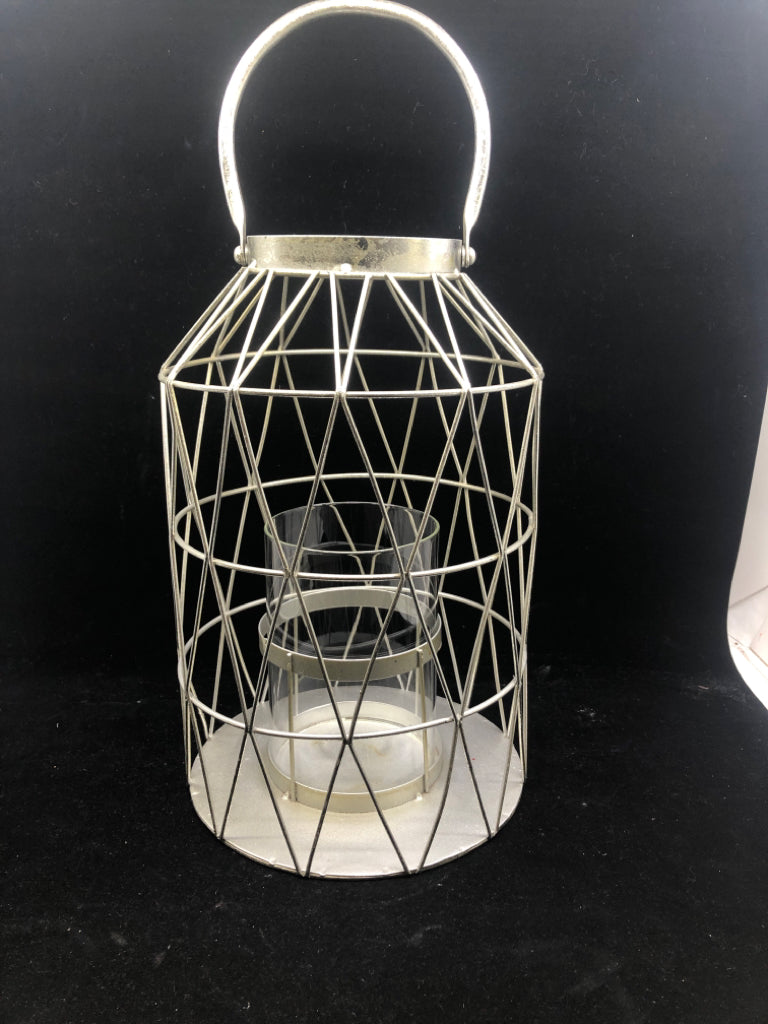 SILVER METAL HANGING CANDLE.