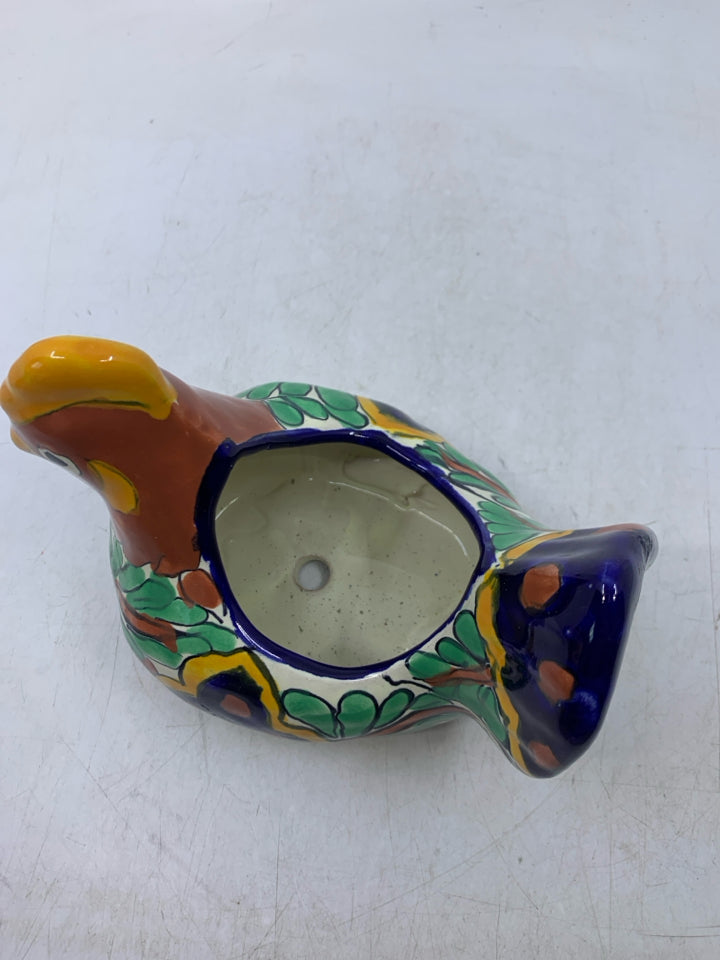 TERRA COTTA LAYING HEN W/ COLORFUL DESIGNS.