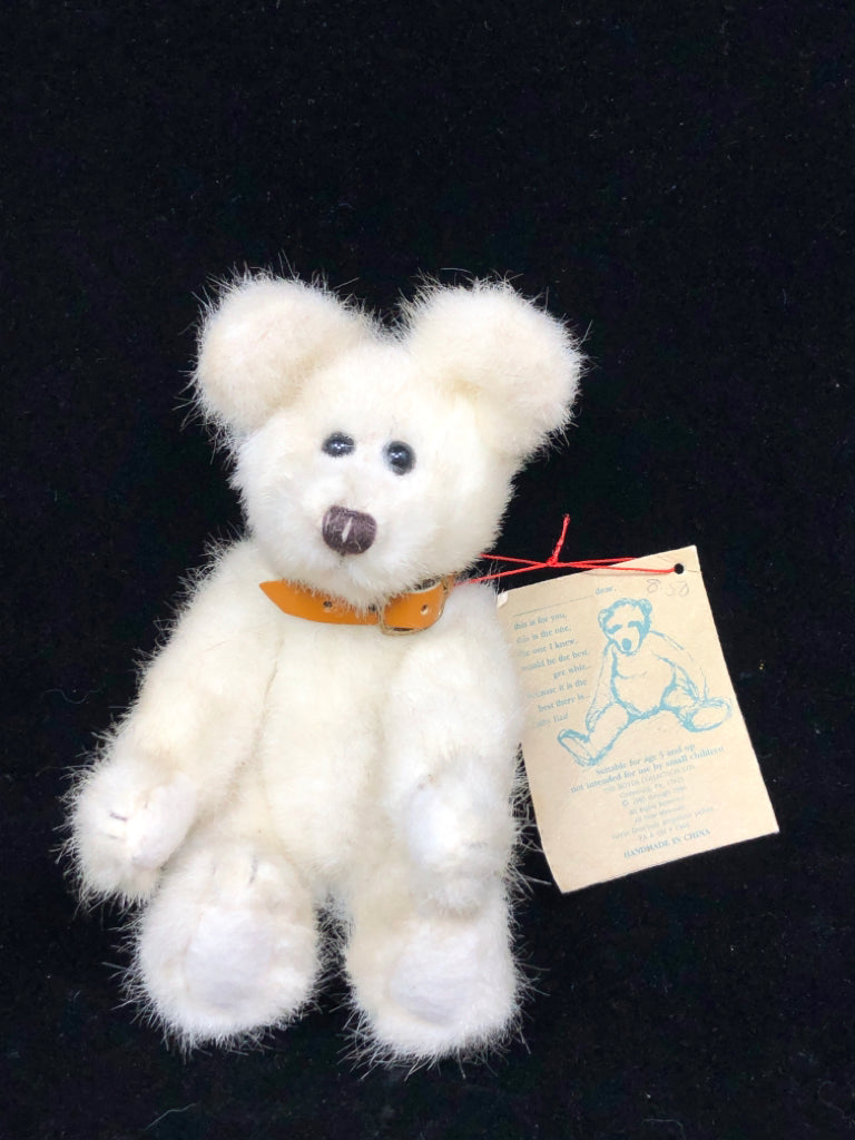 WHITE STUFFED BOYDS BEAR W/LEATHER COLLAR.
