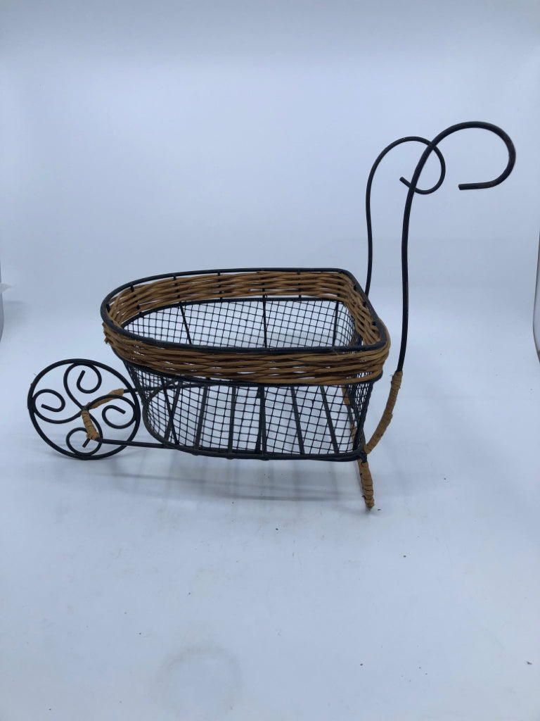 METAL WIRE WHEELBARROW BASKET PLANTER.