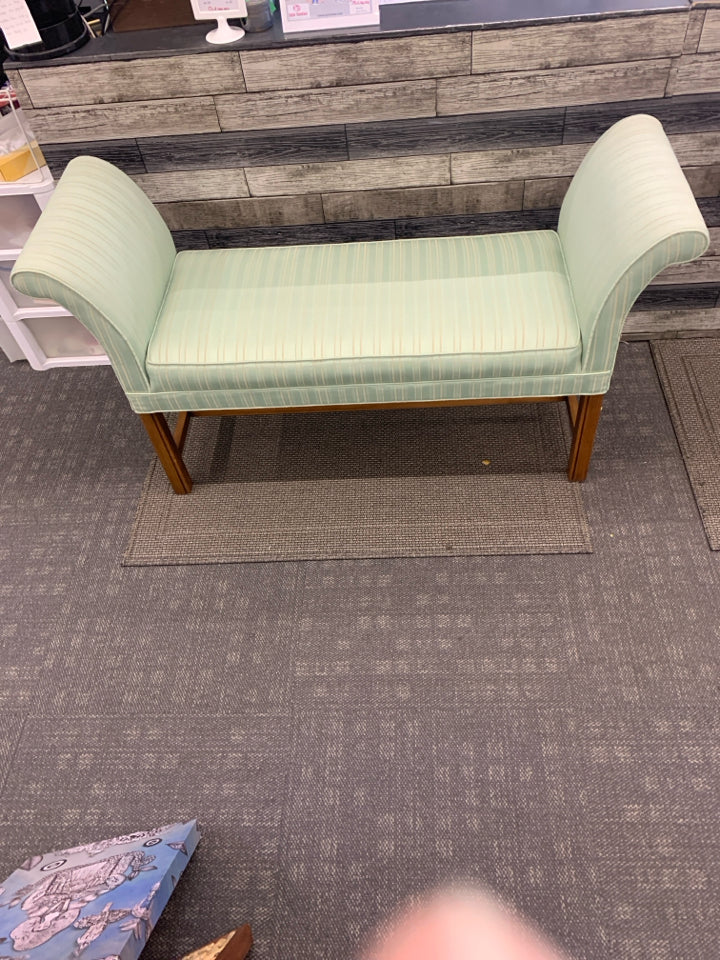 MINT GREEN W/ STRIPES BENCH W/ RAISED EDGES.