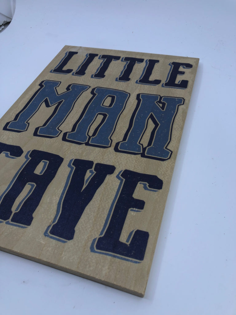 LITTLE MAN CAVE WALL ART.