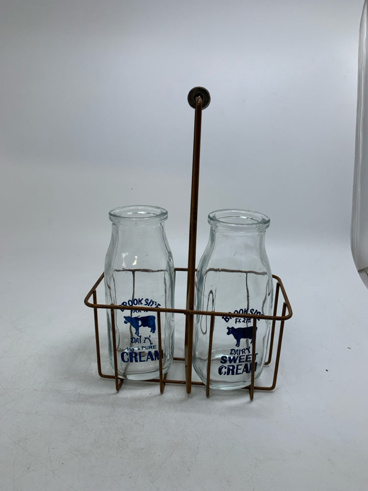 METAL 2 SLOT CRATE W/ BROOKSIDE CREAM BOTTLES.