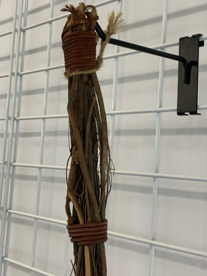 BROWN TWIG BROOM DECOR.