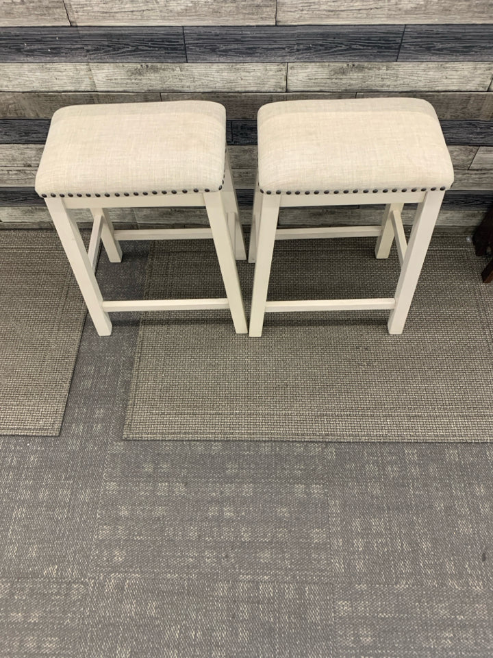 2 CREAM W GREY CUSHION STOOLS.