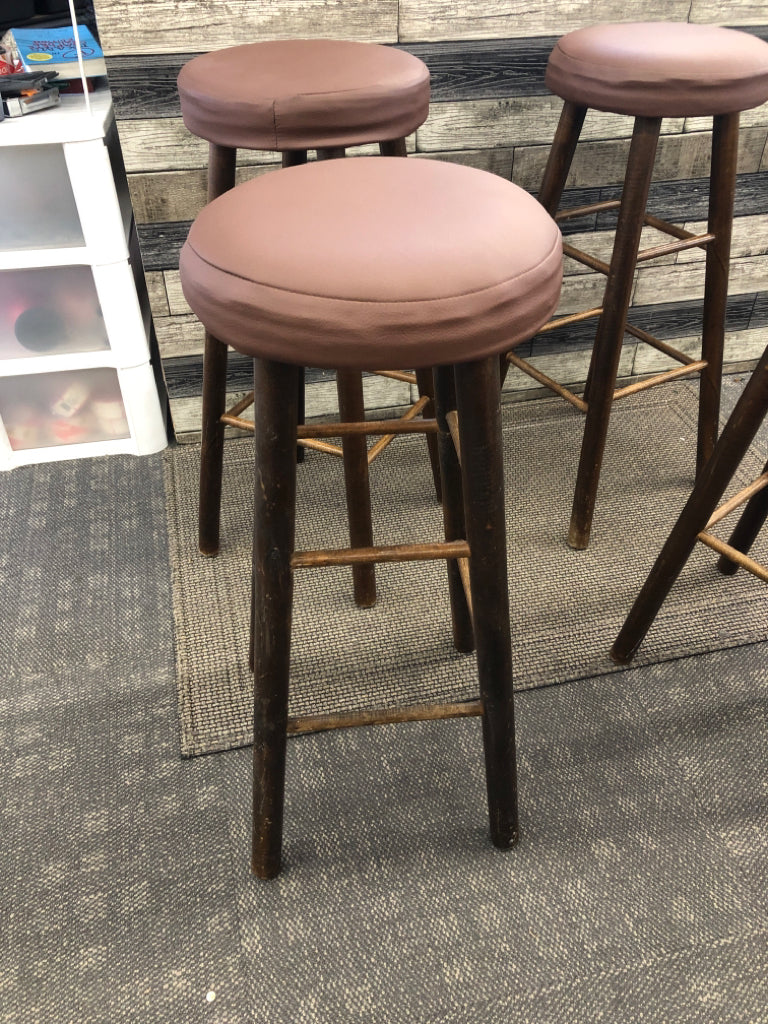 4 FAUX LEATHER BAR STOOLS.