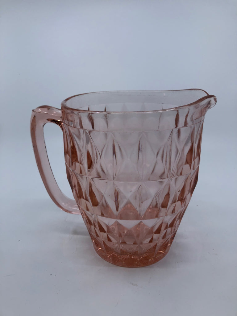 VTG PINK GLASS HEAVY PITCHER.