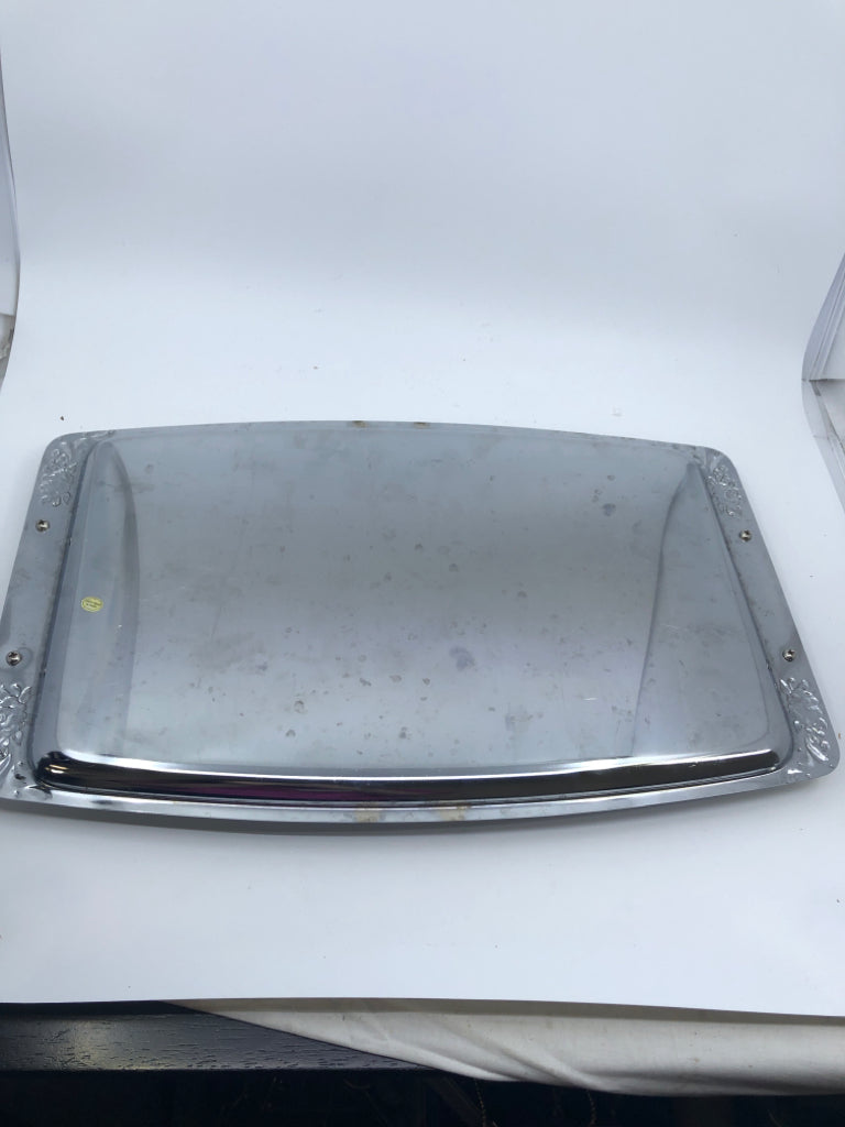 SILVER METAL SERVING TRAY W GOLD ACCENTED HANDLES.
