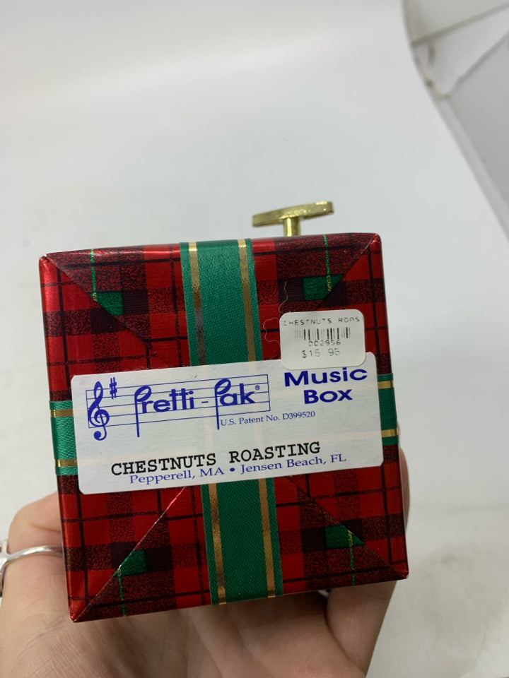 WRAPPED PRESENT MUSIC BOX CHESTNUTS ROASTING.