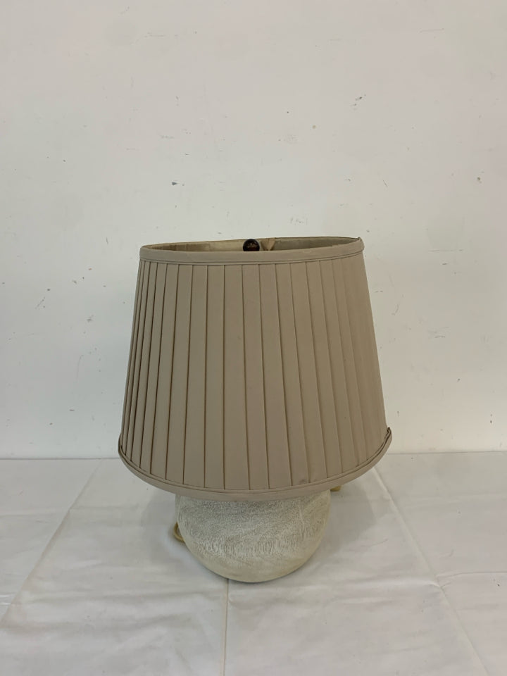 WHITE BASE AZTEC PATTERN LAMP W CREAM SHADE.