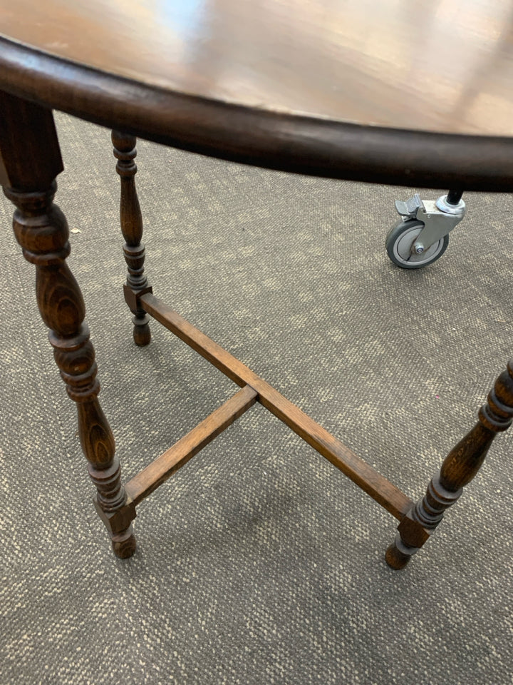 VTG HALF CIRCLE HALL TABLE W/SPINDLE LEGS.