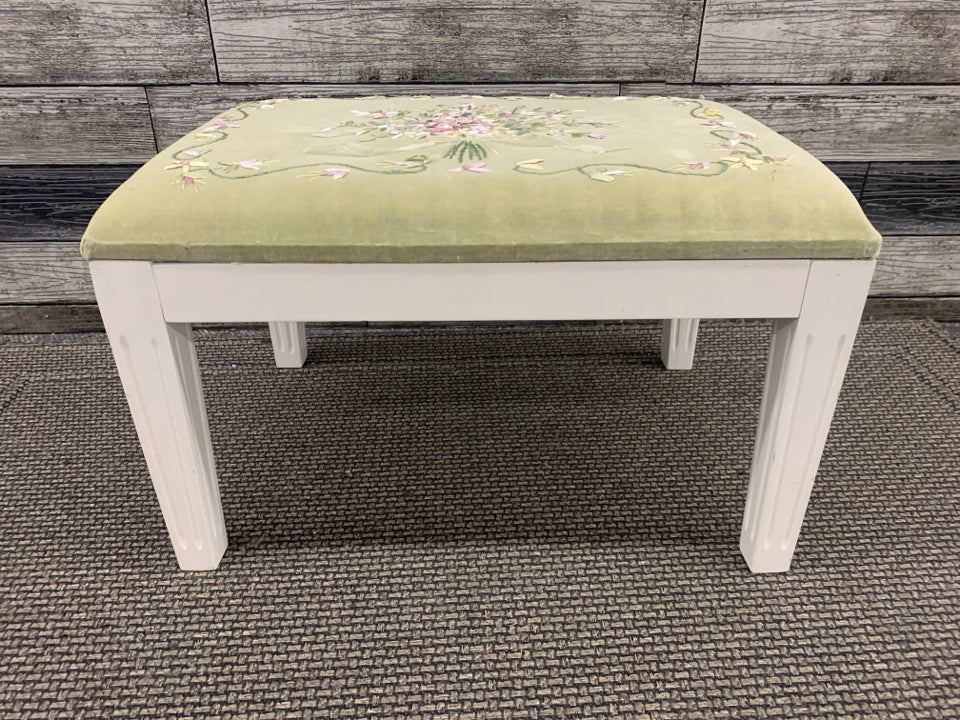 GREEN EMBROIDERED FOOT STOOL W WHITE LEGS.