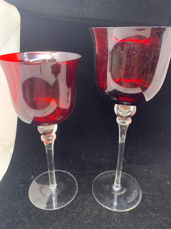 2 CLEAR GLASS STEM W/ RED GLASS TOP CANDLE HOLDERS.