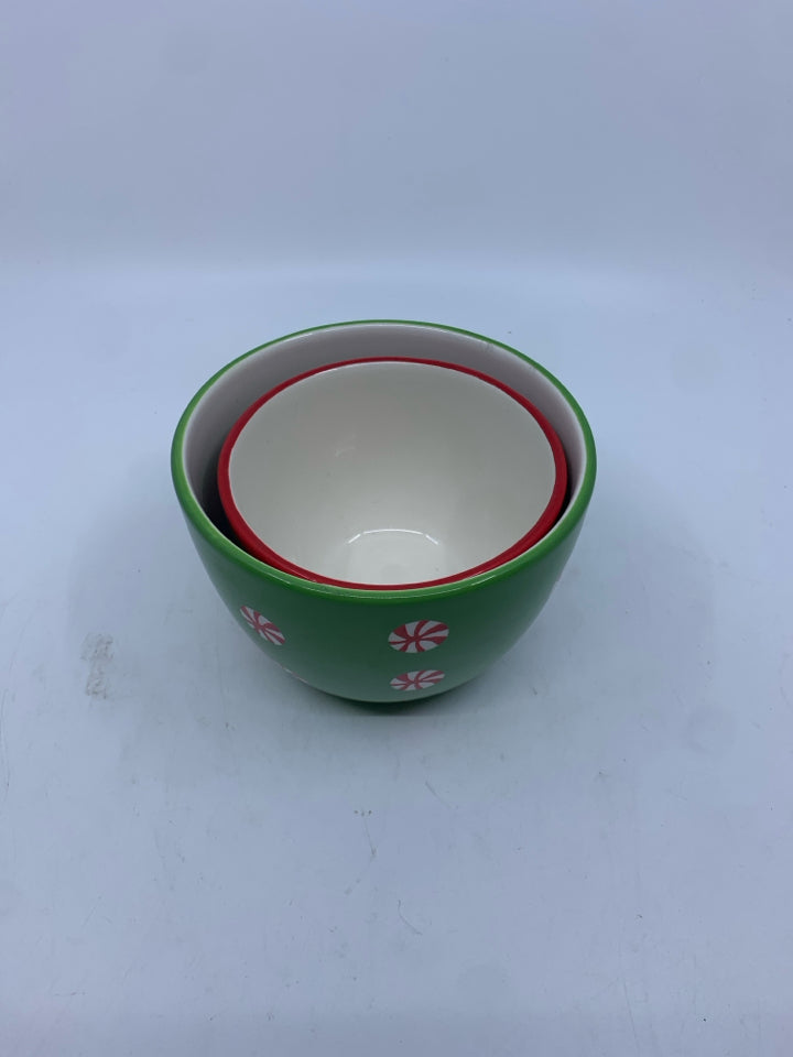 2 GREEN AND RED NESTING BOWLS.