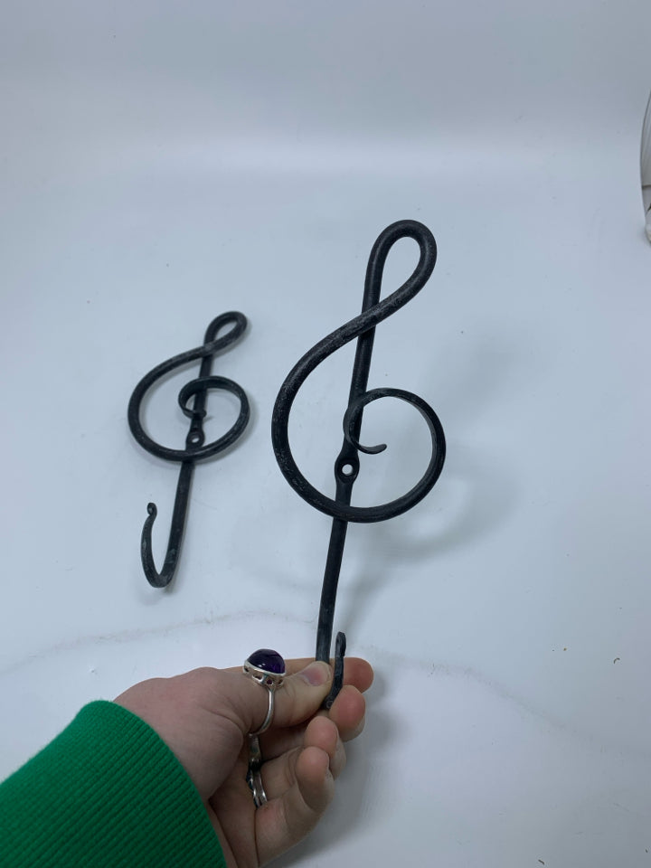2 METAL MUSIC NOTE SHAPED HOOKS.