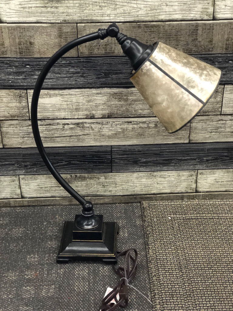 BRONZE BASE CURVED ARM TABLE LAMP W/IRIDESCENT SHADE.