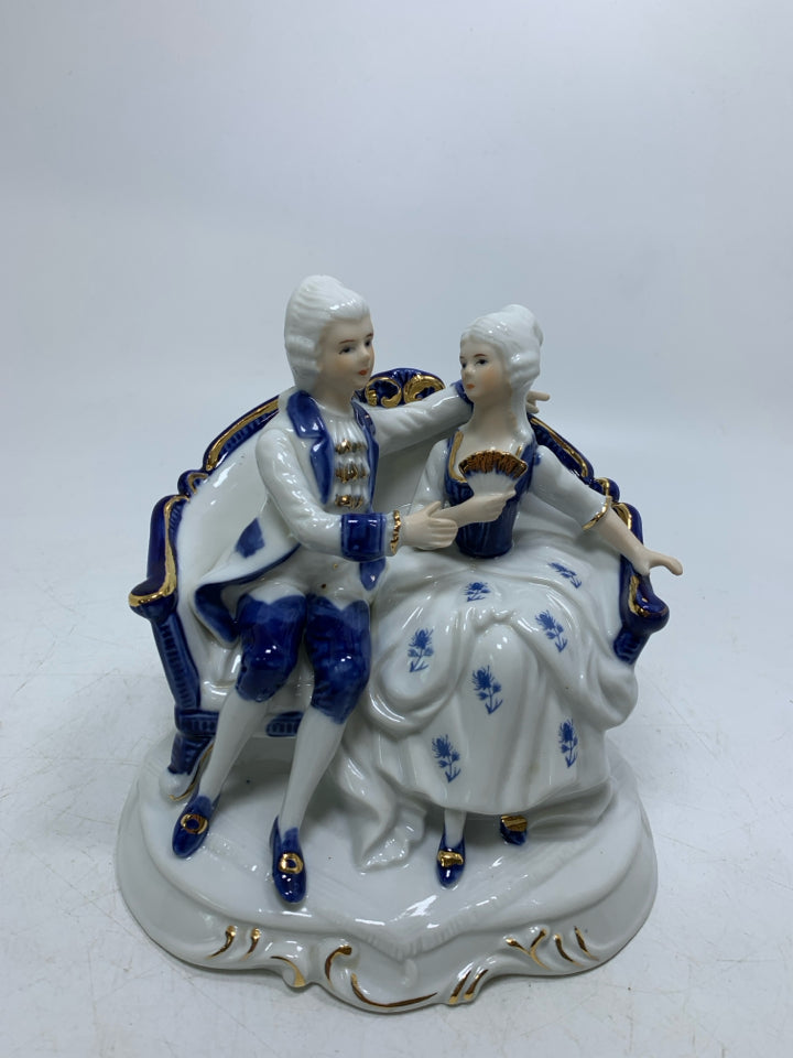 VICTORIAN MAN/WOMAN SITTING ON COACH BLUE/WHITE.
