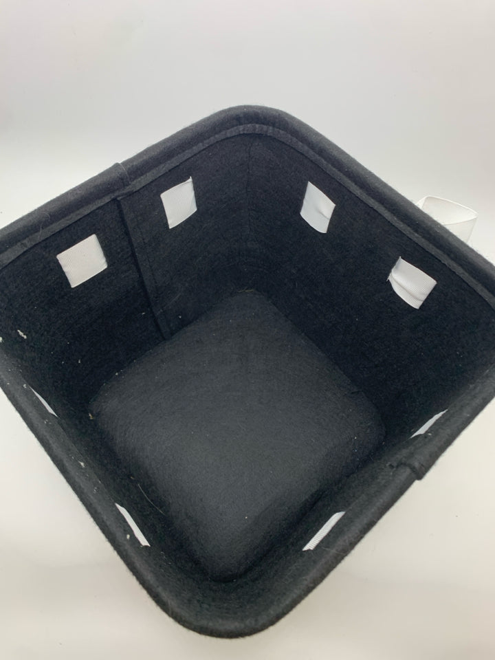 BLACK AND WHITE FELT BASKET WITH BOW.