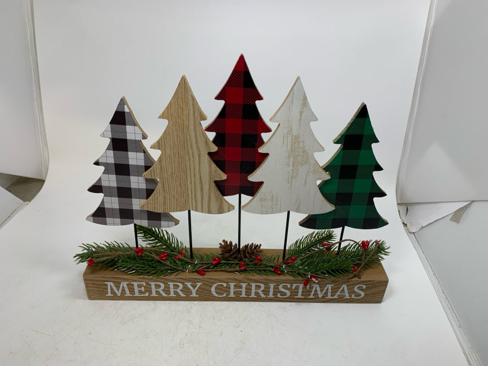 5 ASSORTED TREES ON STAND MERRY CHRISTMAS SIGN.