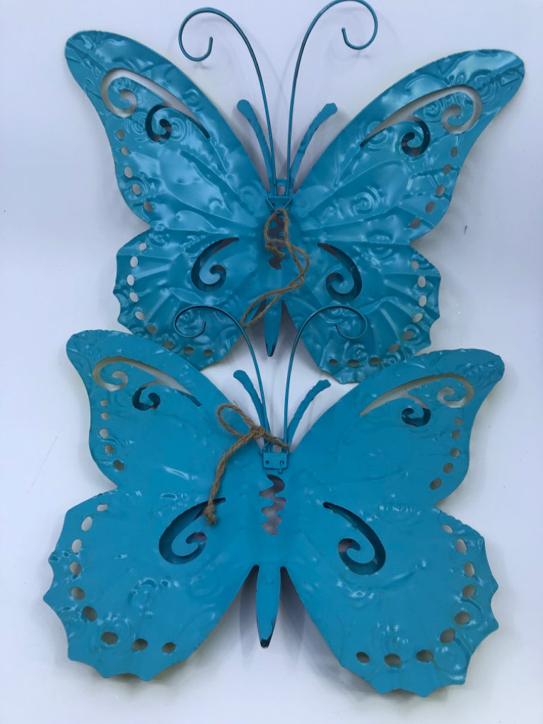 2 WALL HANGING BLUE/ PURPLE BUTTERFLIES.