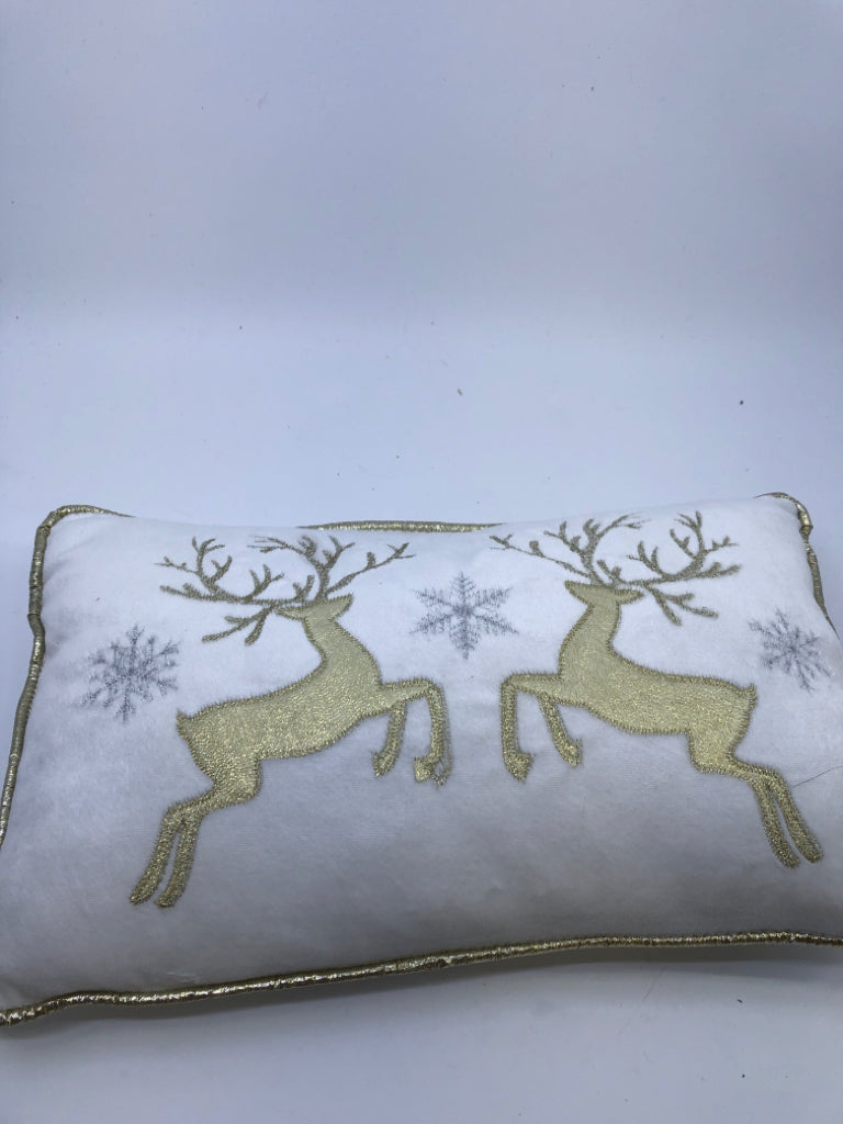 GOLD AND WHITE DEER PILLOW.