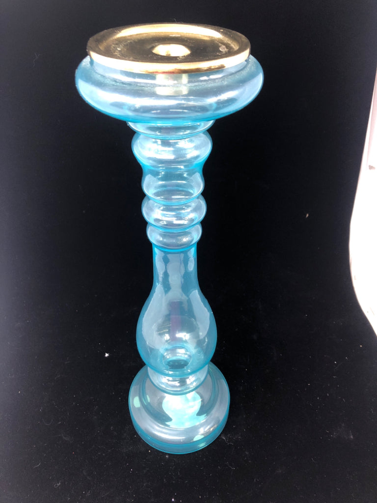 LIGHT BLUE GLASS CANDLE HOLDER.