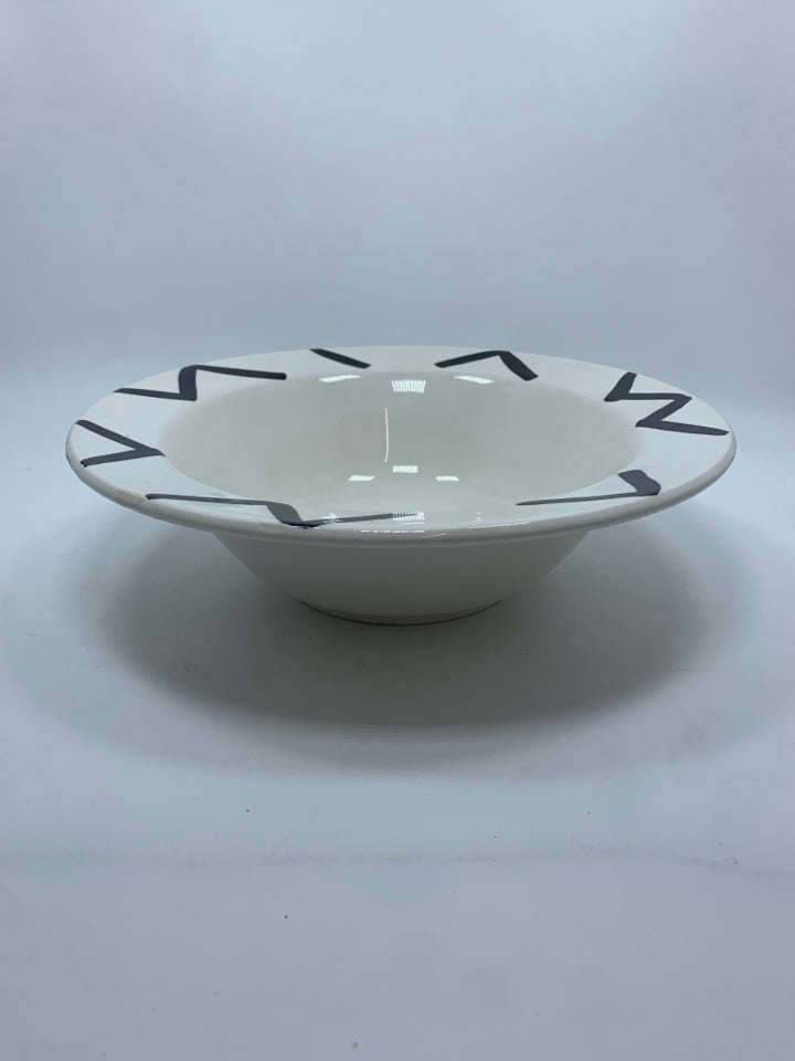 WHITE CERAMIC BOWL W/BLACK LINES.