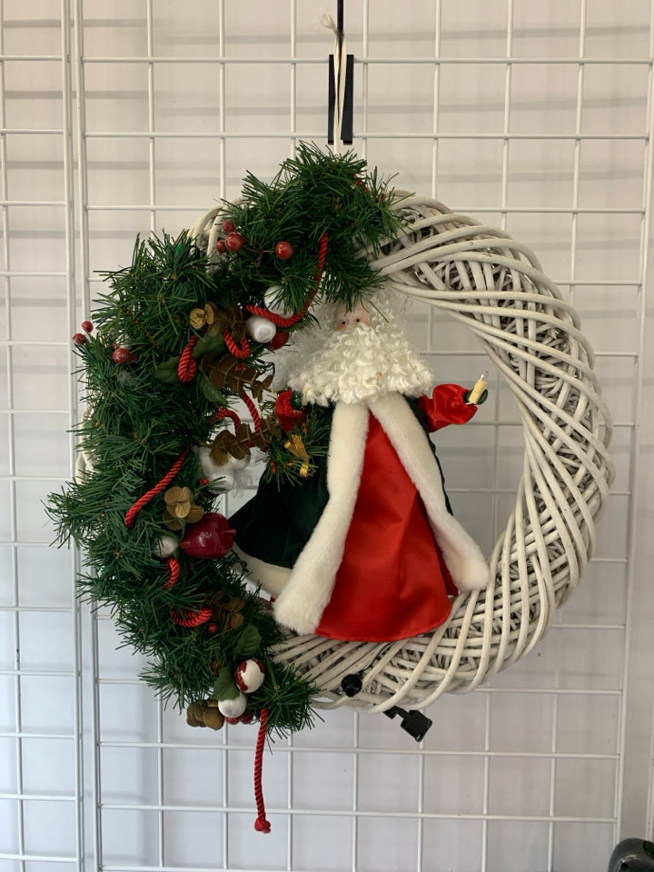 WHITE TWIG WREATH W SANTA CENTER WITH LIGHTS & MUSIC.