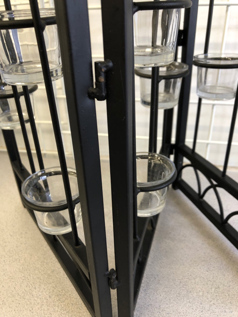 BLACK METAL FOLDING TEALIGHT HOLDER.