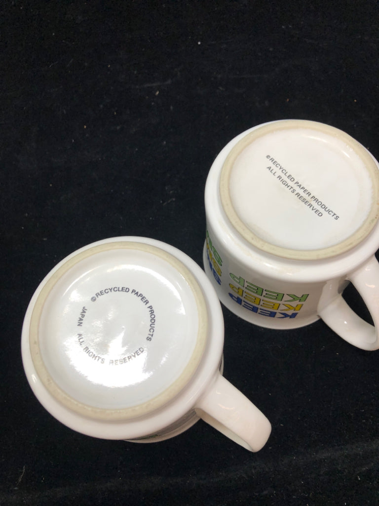 2 'KEEP SMILING' SANDRA BOYNTON MUGS.
