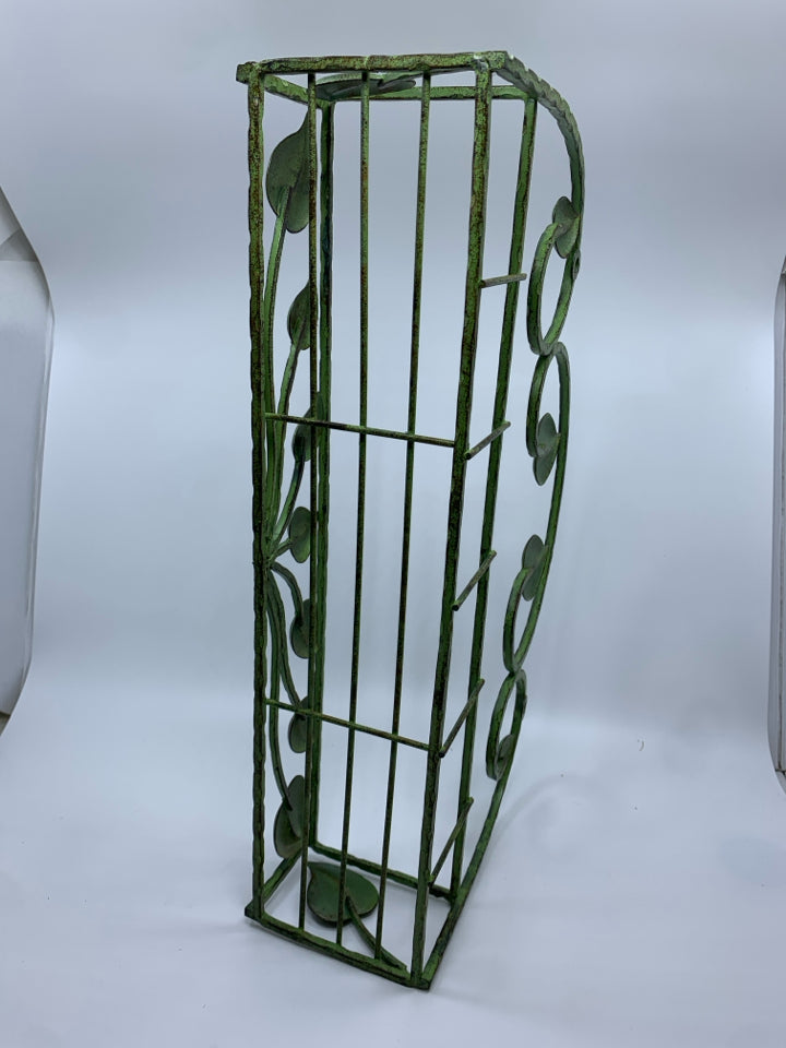 GREEN METAL LEAF SCROLL BASKET.