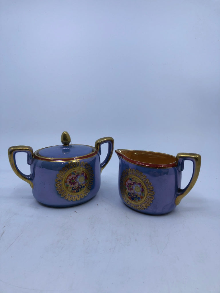 VTG BLUE AND ORANGE FLORAL W GOLD ACCENTS CREAMER AND SUGAR.