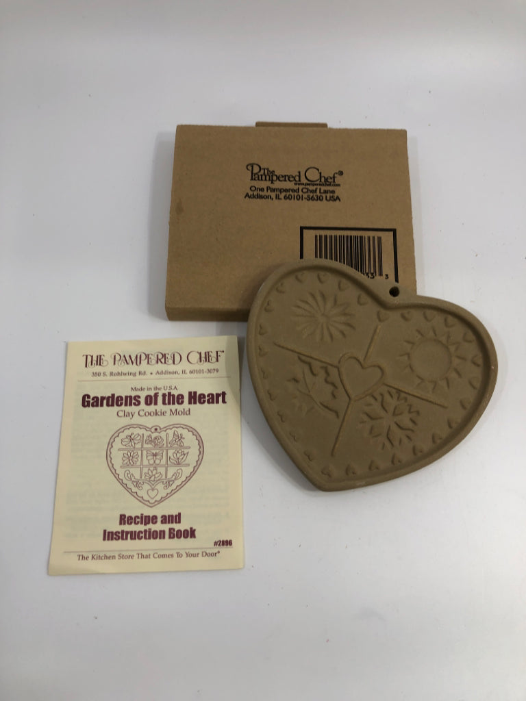 PAMPERED CHEF HEART SHAPED CLAY COOKIE MOLD.