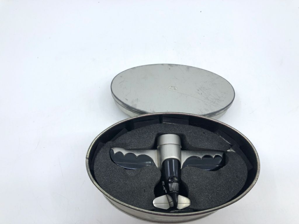 SMALL FOSSIL AIRPLANE DESK CLOCK- IN TIN.