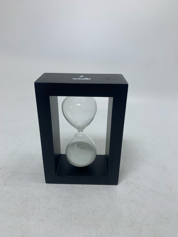 HOUR GLASS IN FRAME.