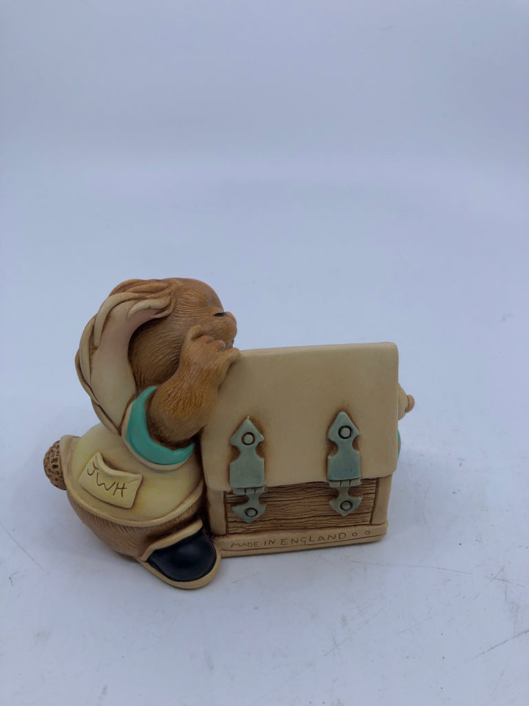 VTG PENDELFIN BUNNY PUTTING AWAY HIS TOYS.