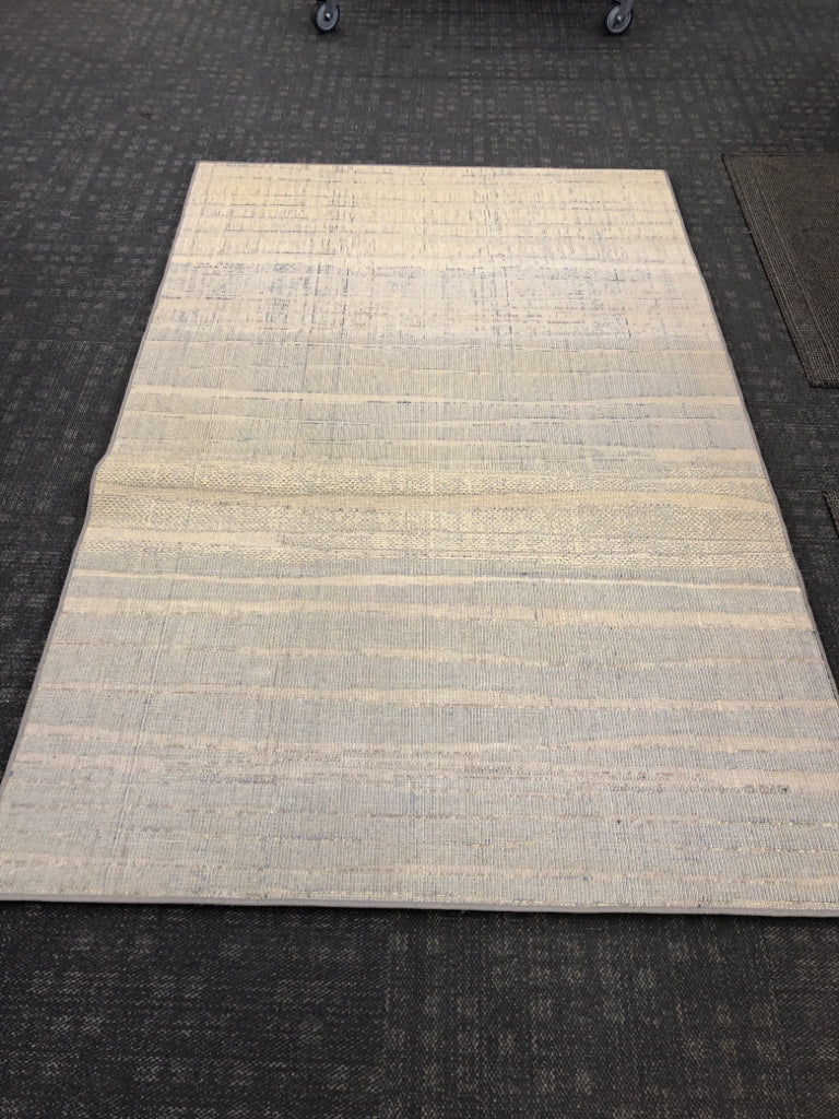 BLUE & CREAM OMBRE RUG.