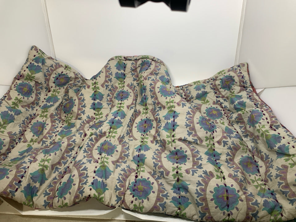 QUILTED FLORAL BODY PILLOW SHAM.