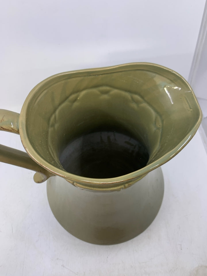 LARGE CERAMIC PITCHER W/ EMBOSSED DETAILED NECK.