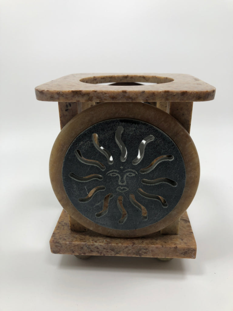 MARBLE CANDLE HOLDER W/METAL SUN DECALS.