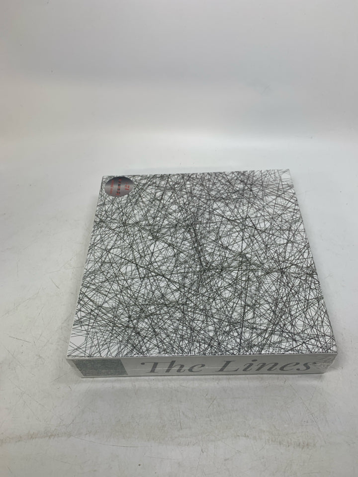 BLACK SCRIBBLES PUZZLE.