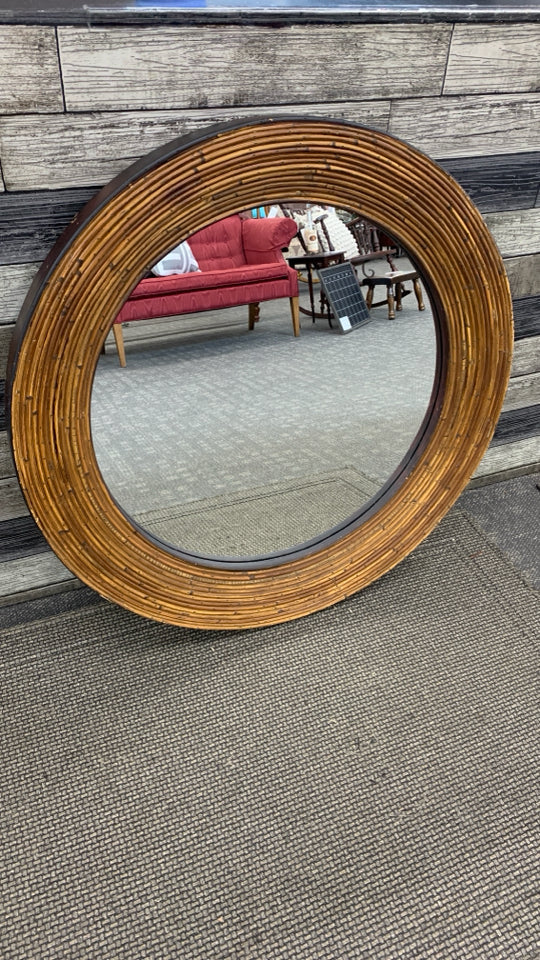 ROUND FAUX BAMBOO WALL MIRROR.
