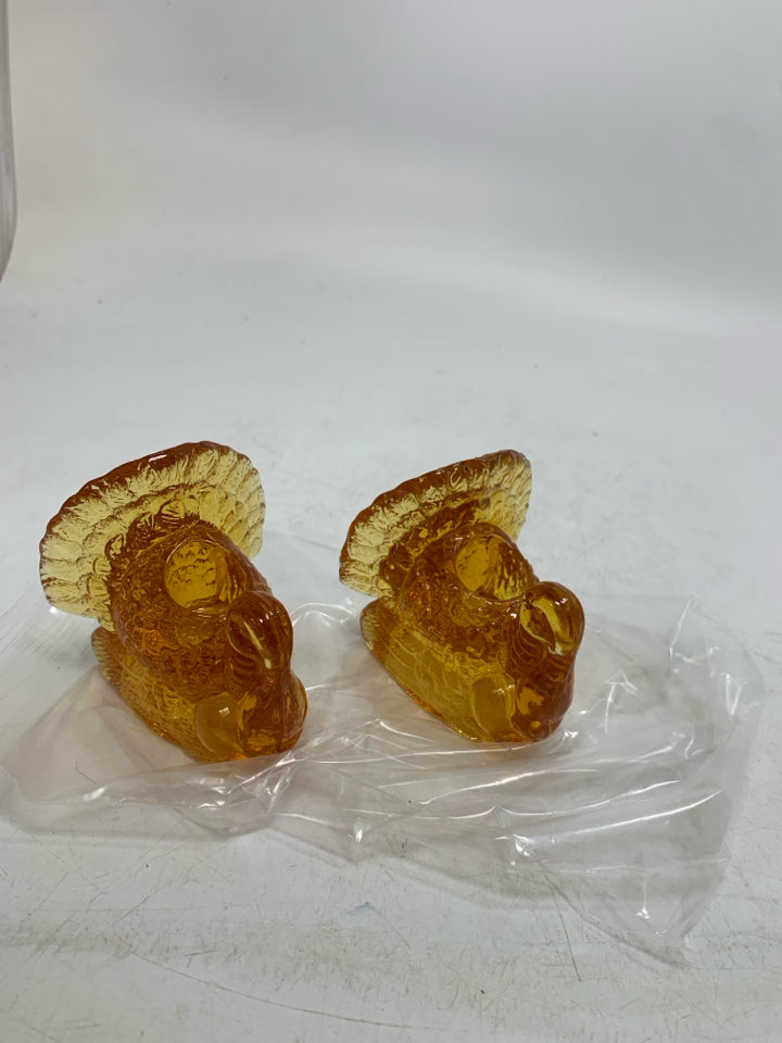 2 EMBER GLASS TAPERED CANDLE HOLDERS IN BAG.