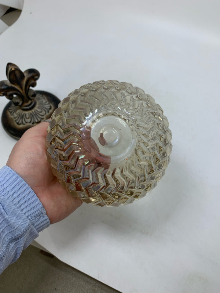 TEXTURED GLASS VASE W/ RESIN SCROLL LID.