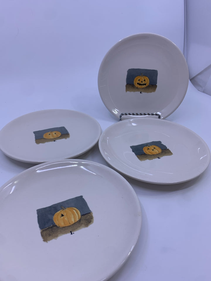 4 RAE DUNN STAGES OF A JACK O LANTERN PLATES.