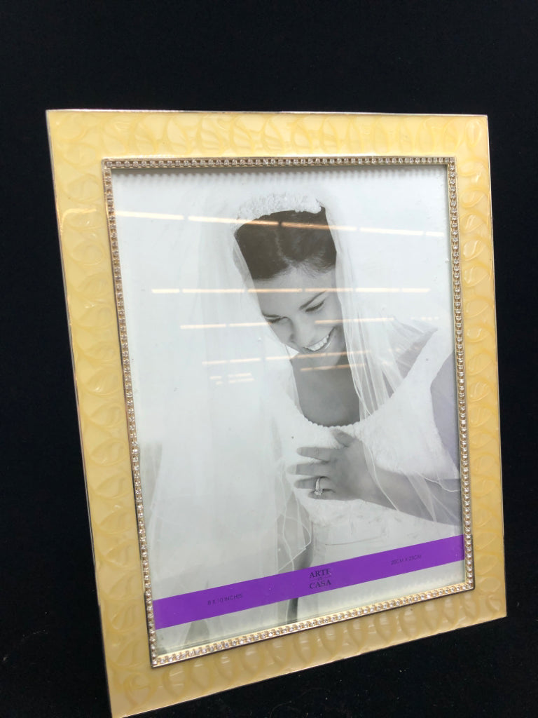 MARBLED YELLOW ENAMEL FRAME W/FAUX DIAMONDS.