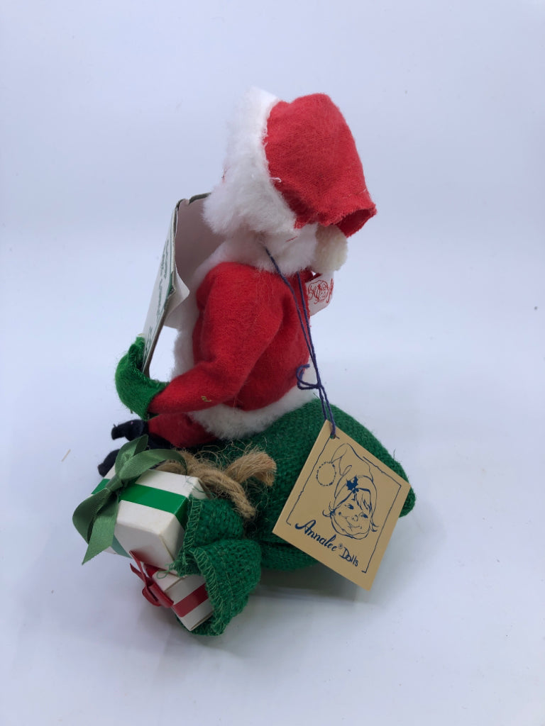 ANNA LEE SANTA HOLDING NAUGHTY NICE BOOK.