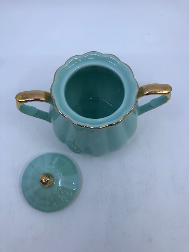 TEAL CERAMIC SUGAR BOWL W/ GOLD DETAILS.