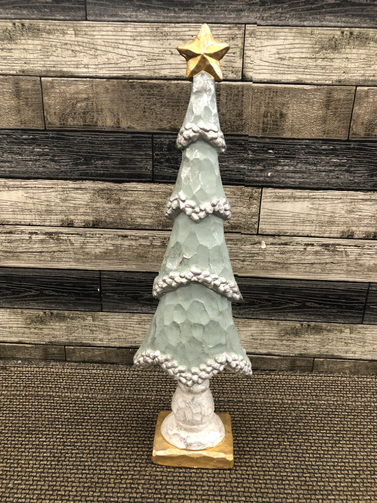 TALL BLUE CERAMIC CARVED CHRISTMAS TREE.